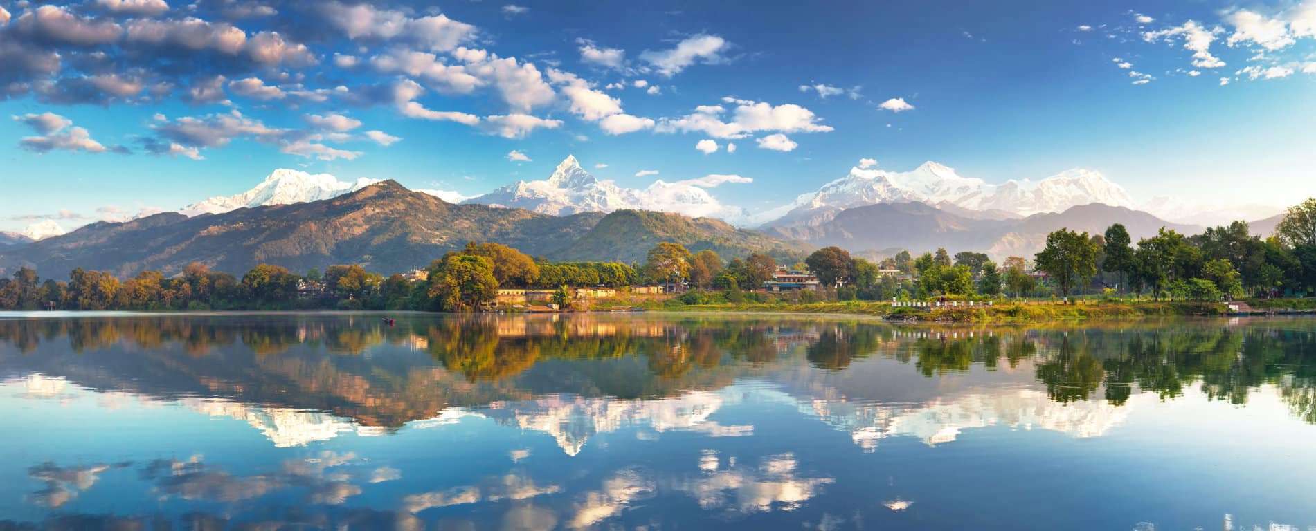 Incredible-Himalayas.-Panoramic-view-from-the-lakeside-at-the-foothills-of-the-magnificent-Annapurna-mountain-range.-AdobeStock_90521420 Minimised